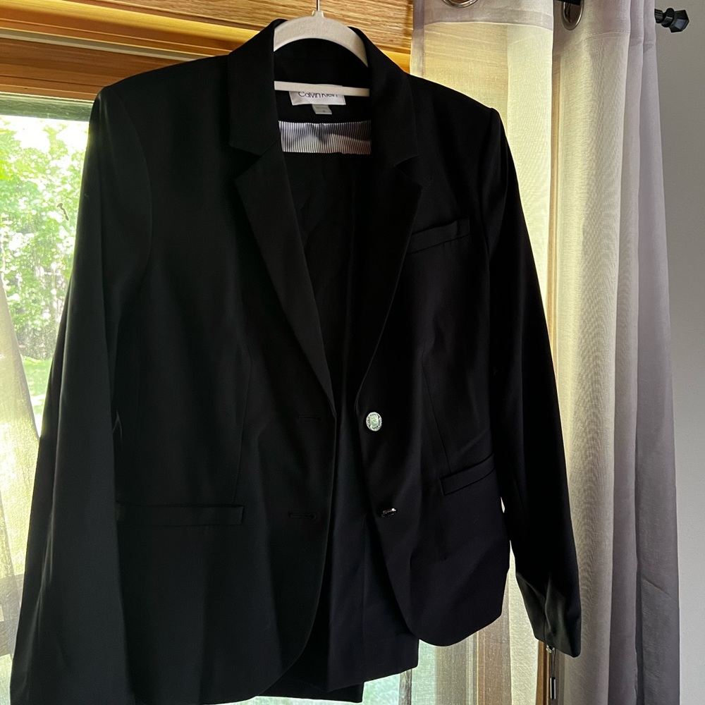 Calvin Klein Navy Suit- new with tags, size 12